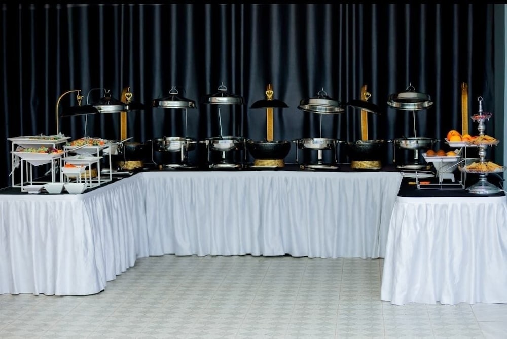 Buffet service at the rooftop restaurant at Wintana Apartments